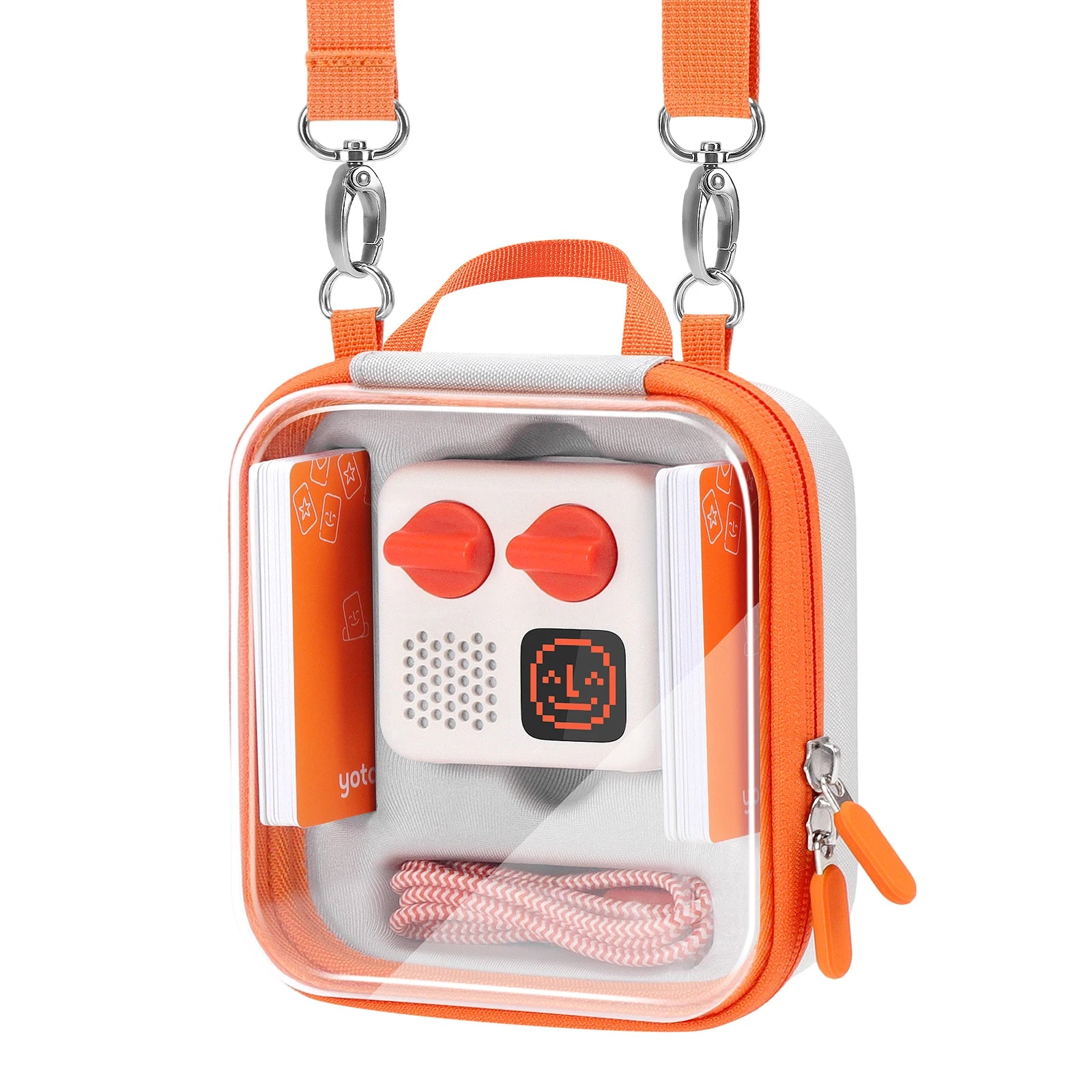 Clear-window travel case with orange crossbody strap holding a kids audio player, cards and cable